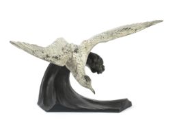 J Loriot (20th Century), cold painted and bronzed spelter model of a seagull in flight.