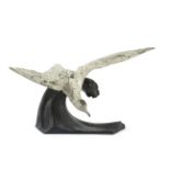 J Loriot (20th Century), cold painted and bronzed spelter model of a seagull in flight.