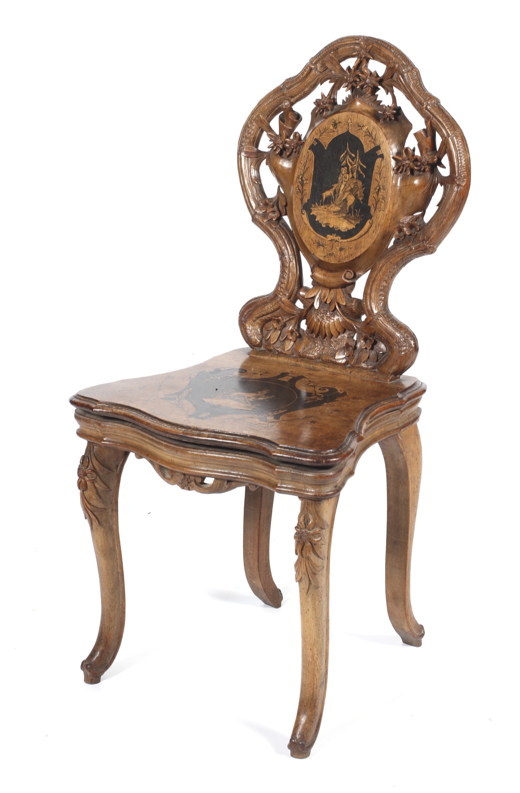 A late 19th century Black Forest carved marquetry and penwork musical chair. - Image 3 of 3