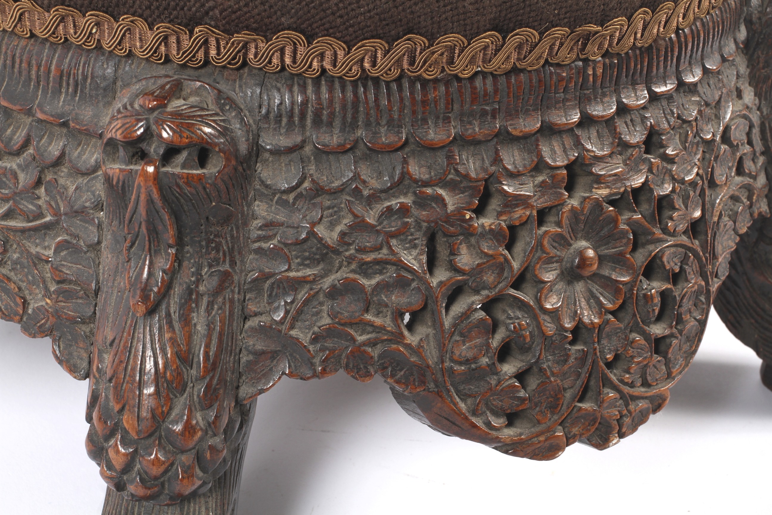 A carved hardwood Anglo-Indian low footstool. - Image 2 of 3