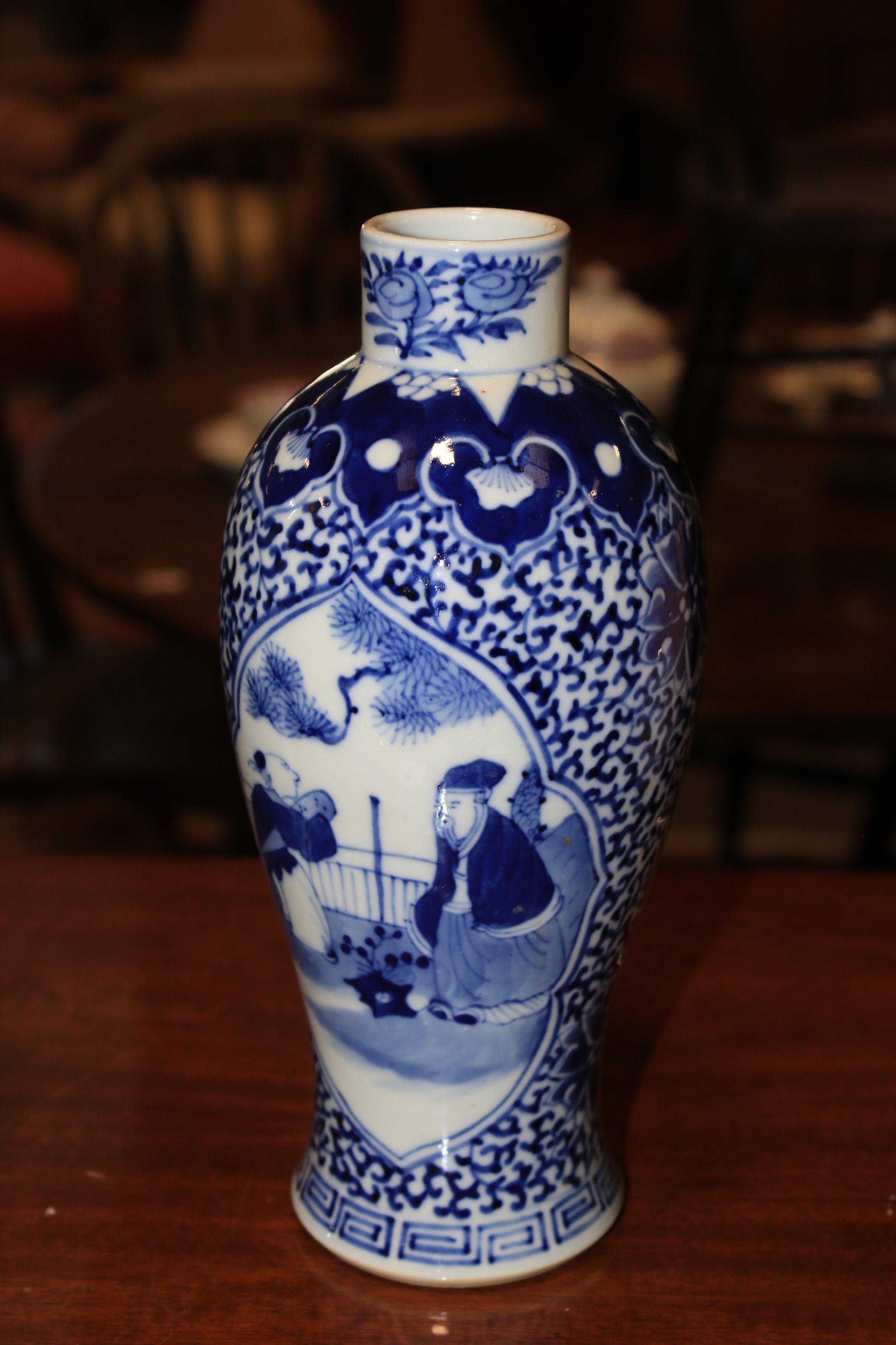 Two Chinese porcelain Qing Dynasty blue and white baluster shaped vases and covers. - Image 5 of 28