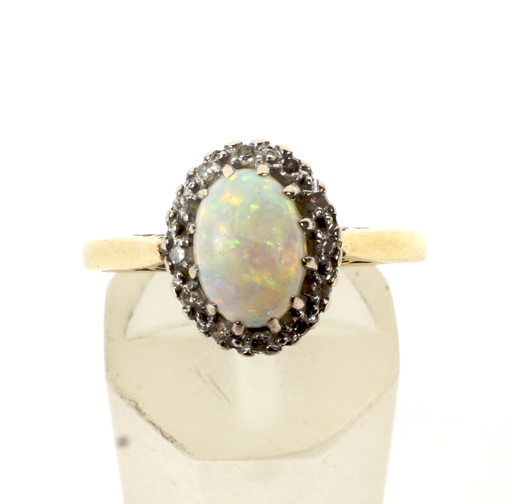 An 18ct gold, opal and diamond oval cluster ring. - Image 2 of 4