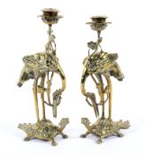 A pair of Japanese candlesticks of unusual form.
