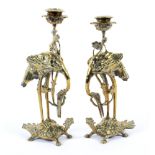 A pair of Japanese candlesticks of unusual form.