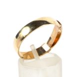 An 18ct gold flat-section wedding band. Approx 4.3mm wide, 1.