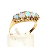 A late Victorian gold and opal five stone ring.