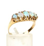 A late Victorian gold and opal five stone ring.