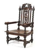 A 19th century carved oak caned hall chair.