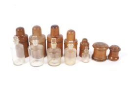 A collection of late 19th/early 20th century turned sycamore apothecary bottle boxes.