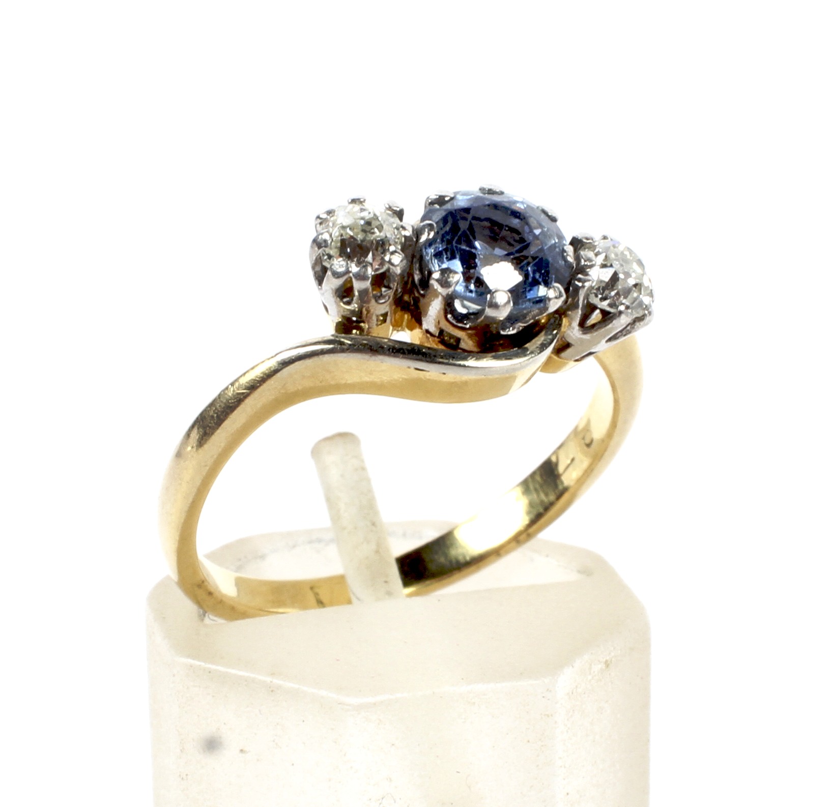 A mid 20th century gold, sapphire and diamond three stone cross-over ring. - Image 4 of 6