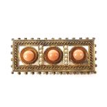 A mid-Victorian gold, coral and half-pearl rectangular brooch in Etruscan style.