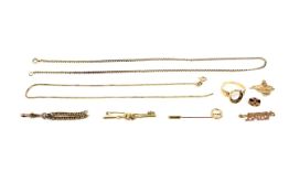 A collection of gold jewellery.