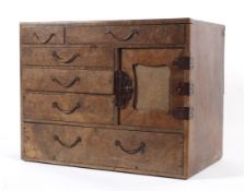 An Asian-style walnut veneered table top cabinet, circa 1900.