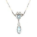 An Edwardian aquamarine, pearl and diamond pendant/necklace/brooch.