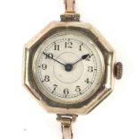An early 9ct gold cased wristwatch.