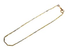 An early 20th century bi-colour gold fancy fetter-link chain.