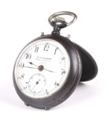 An early 20th century gun metal cased open faced pocket watch/alarm 'The Glow-Worm'.