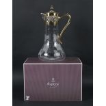 An Asprey silver-gilt mounted claret jug.