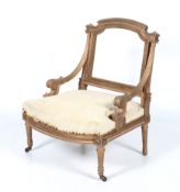 A 19th century French gilt wood upholstered fauteuil elbow chair.