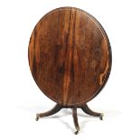 A fine 19th century rosewood circular centre table.