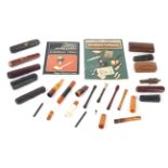 A collection of 20th century cheroot and cigarette holders in case.