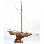 A well made oak pond yacht and stand.