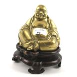 A hollow cast brass laughing Buddha.