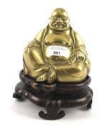 A hollow cast brass laughing Buddha.