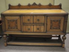 An early 20th century oak sideboard.