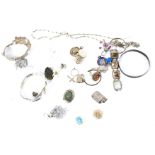 Collection of silver and white metal jewellery. Including bangles, rings, necklaces, pendants, etc.