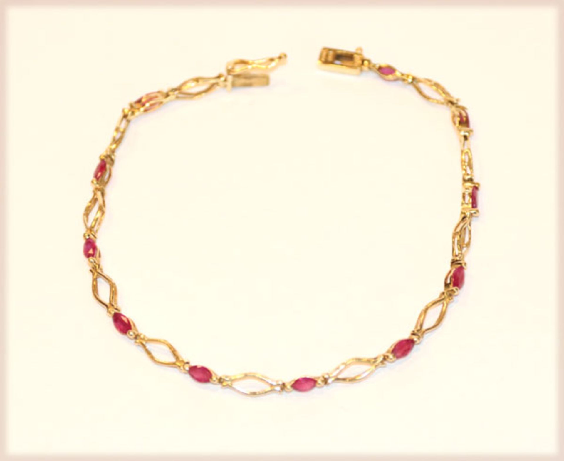 14 k Gelbgold Armband mit 11 Rubinen, 4,6 gr., L 19 cm
