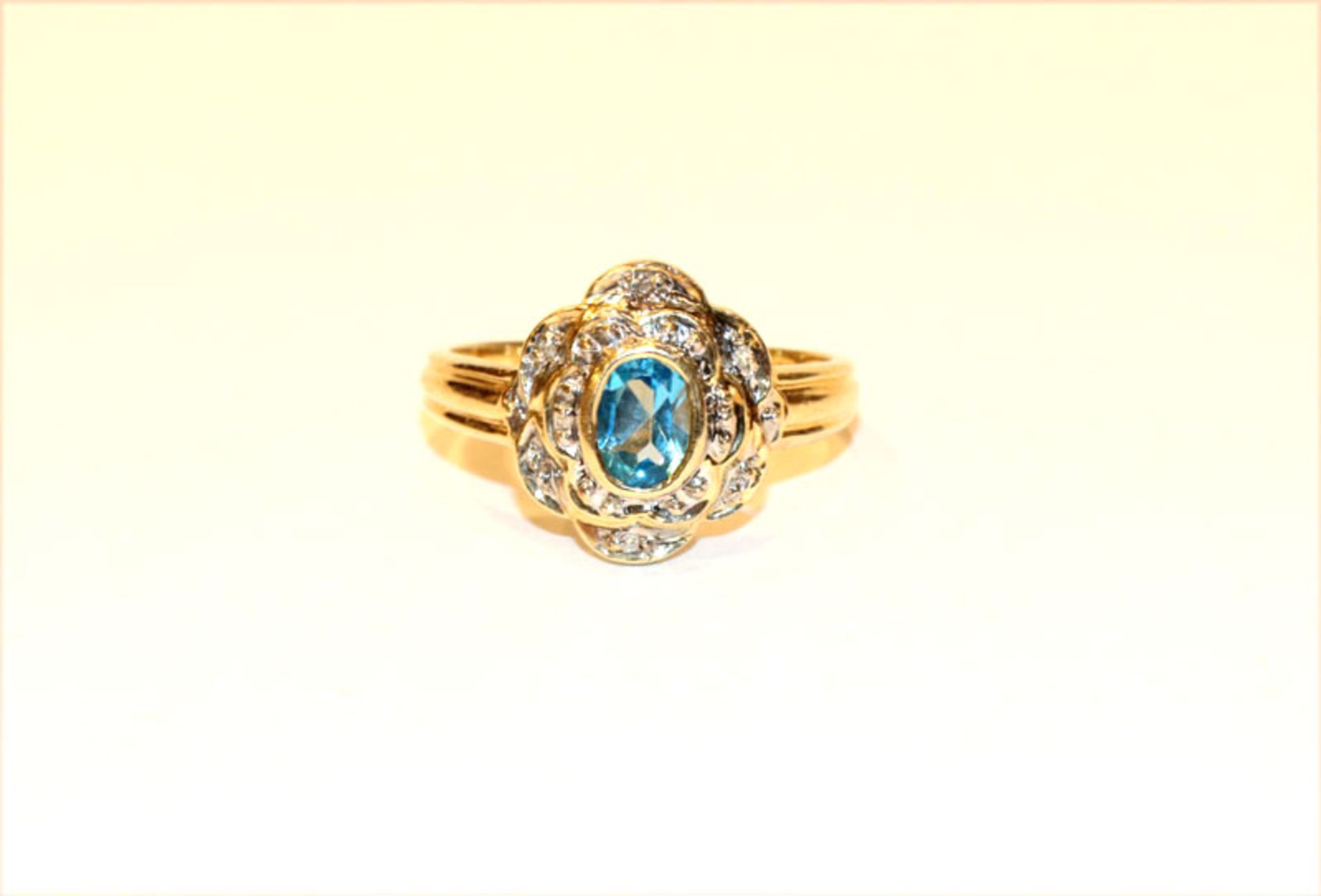 14 k Gelb- und Weißgold Ring mit Blautopas, 4,7 gr., Gr. 62