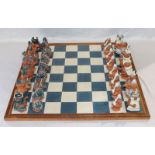 Schachspiel mit Tonfiguren, bez. Handarbeit aus Portugal, auf Fliesenbrett, Figuren teils weiß/