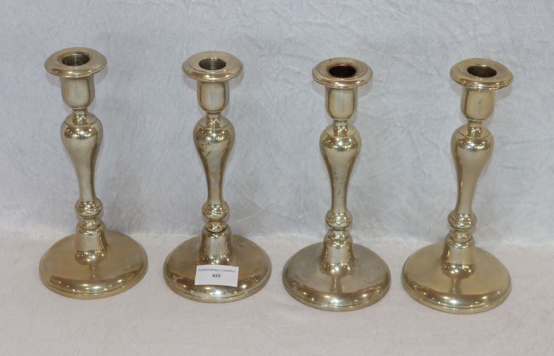4 gleiche Kerzenleuchter, versilbert, H 22 cm, D 10 cm, teils verbeult, Gebrauchsspuren