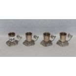 4 Schnapsbecher mit Henkel auf reliefiertem Fuß, 835 Silber, 97 gr., H 4,5 cm, D 6 cm,