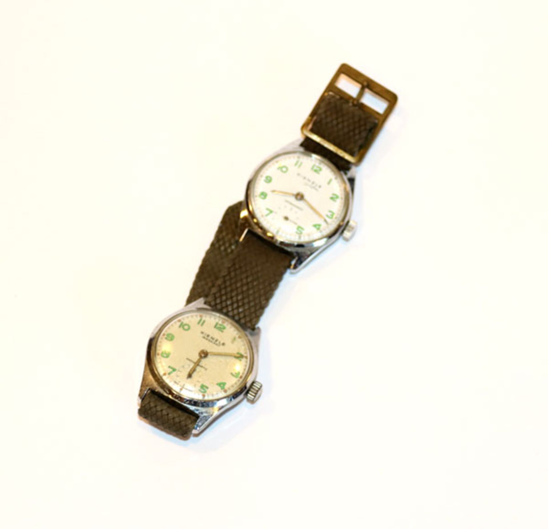 2 Kienzle Armbanduhren, Alfa und Markant, auf einem Armband, wohl intakt, Tragespuren
