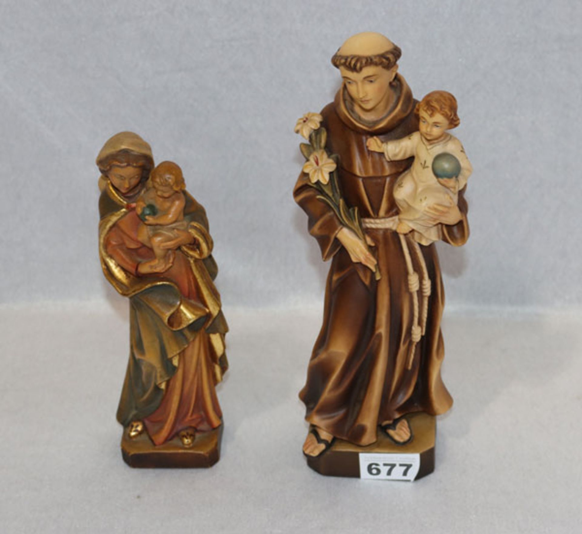 2 Holzfiguren 'Maria mit Kind', H 24 cm, und 'Heiliger Antonius', H 30 cm, beide farbig gefaßt