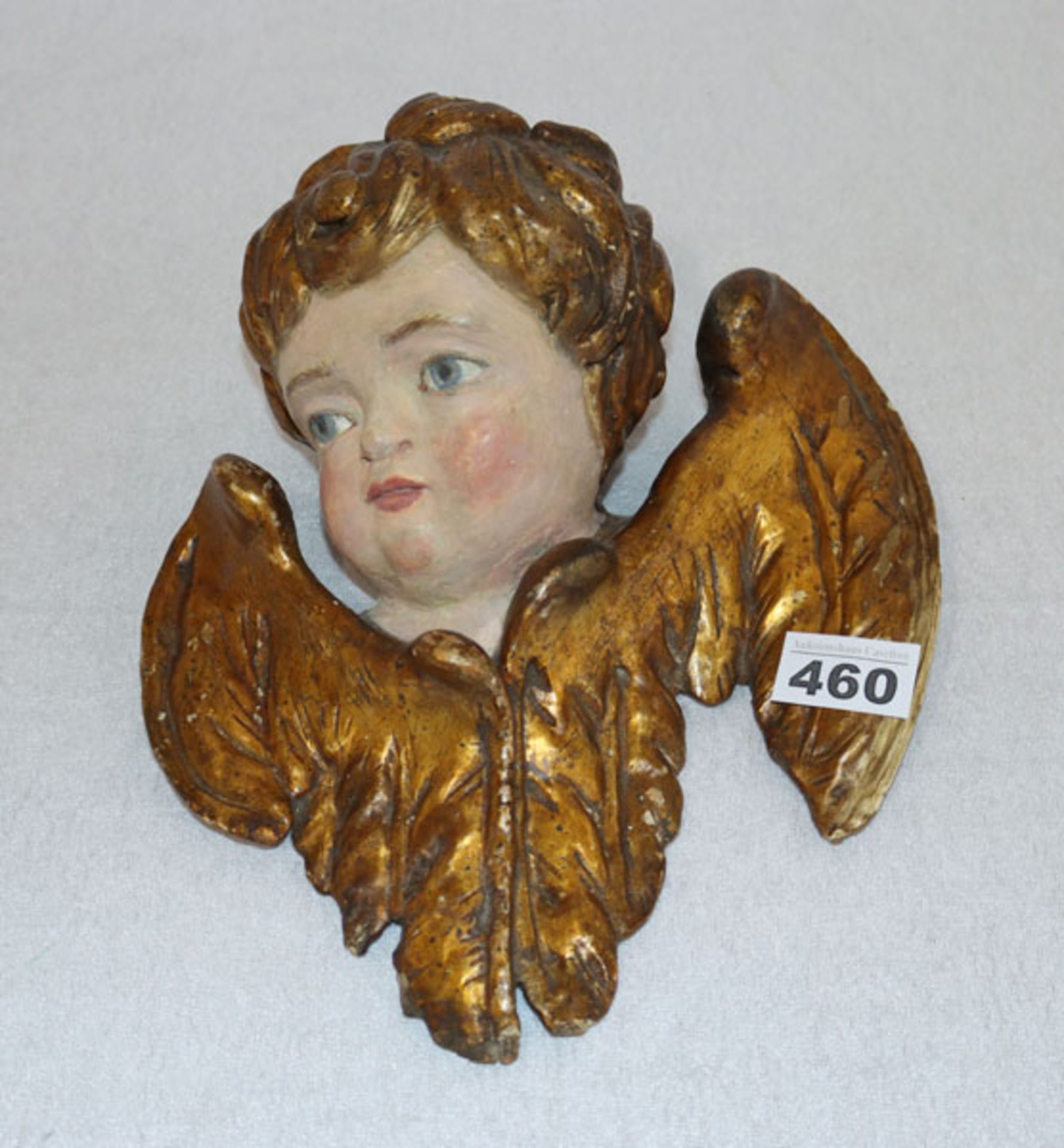 Holzfigur 'Putto', farbig gefaßt, H 26 cm, B 24 cm, teils beschädigt und Farbablösungen