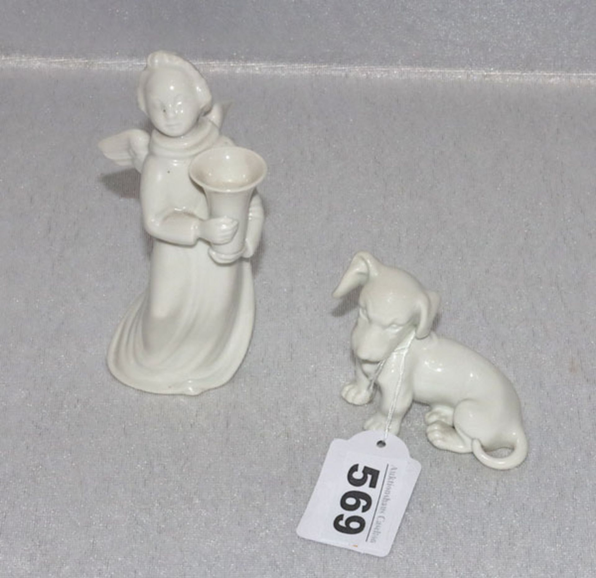 Porzellan Tierfigur 'Hund', H 6 cm, Wien ? und 'Leuchterengel', H 12 cm, beide weiß glasiert