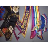 Two Isle of Wight Masonic aprons, two others and other items of Masonic regalia.