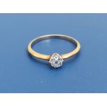 A small old cut diamond solitaire diamond ring, weighing approximately 0.25 carat on yellow metal