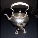 A William IV Paul Storr silver tea kettle with burner on stand, of plain circular form with double-