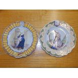 A pair of 19thC tin glazed plates, each painted with a study of a young Breton woman, one at a font,