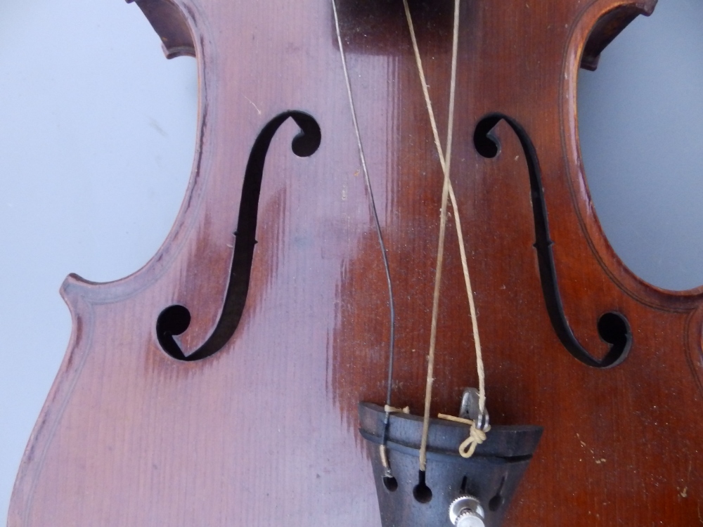 A Stradivarius copy violin by E R Schmidt & Co with 14.25" two piece back, together with two bows in - Image 7 of 12