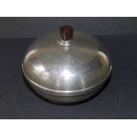 An art deco engine turned silver spherical powder bowl, having brown bakelite finial and lining to