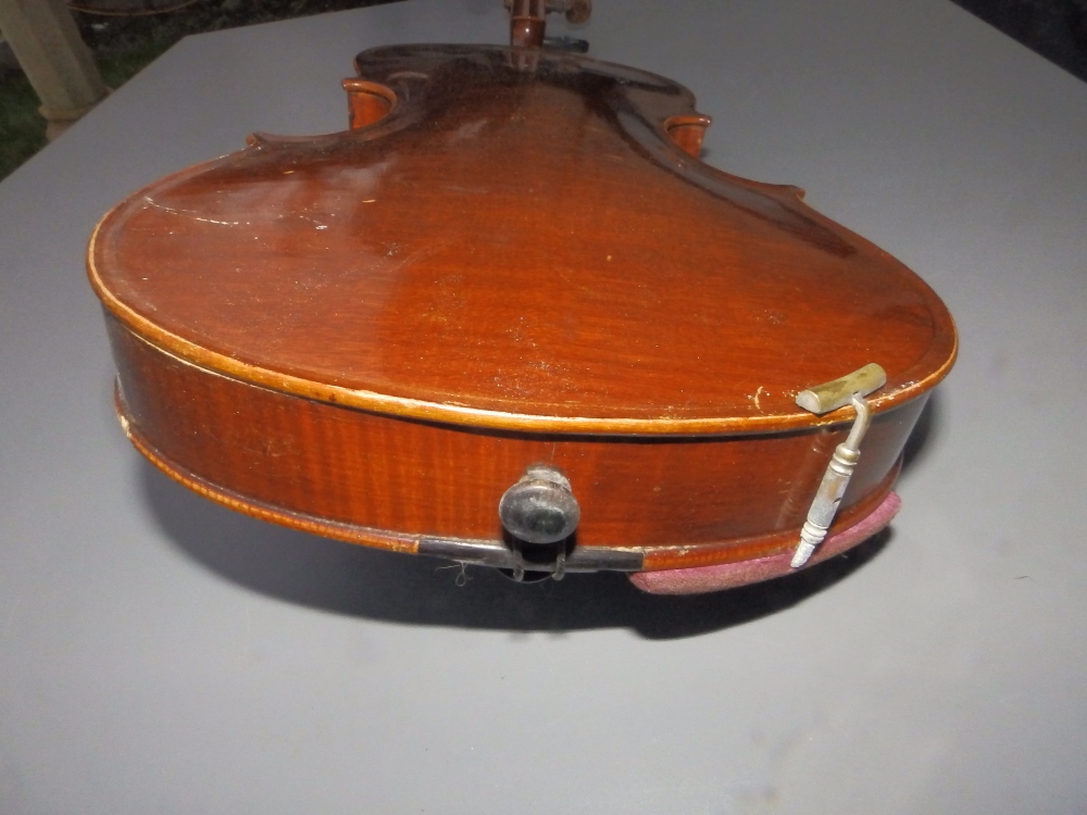A Stradivarius copy violin by E R Schmidt & Co with 14.25" two piece back, together with two bows in - Image 12 of 12