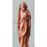 A 17thC carved boxwood knife handle depicting St Simon, with white metal ferrule