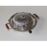 A George III silver heated muffin dish, the reeded domed cover with entwined dolphin finial, knurled