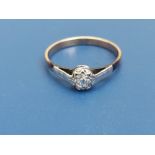 A small illusion set old cut diamond solitaire ring, the stone of approximately 3mm diameter, set in
