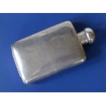 An all-silver hip flask of plain design by Mappin & Webb, London 1920, 6.25" high.